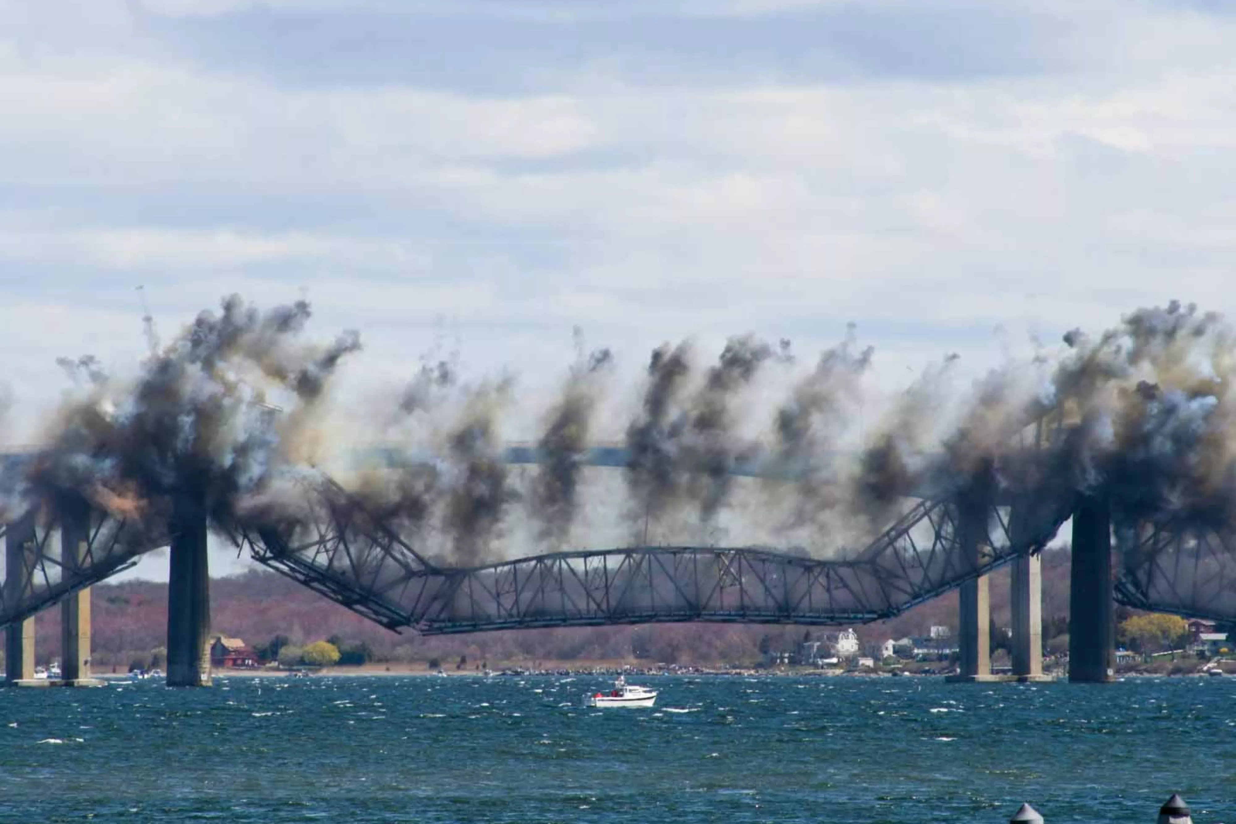 Demolition of bridge over a river