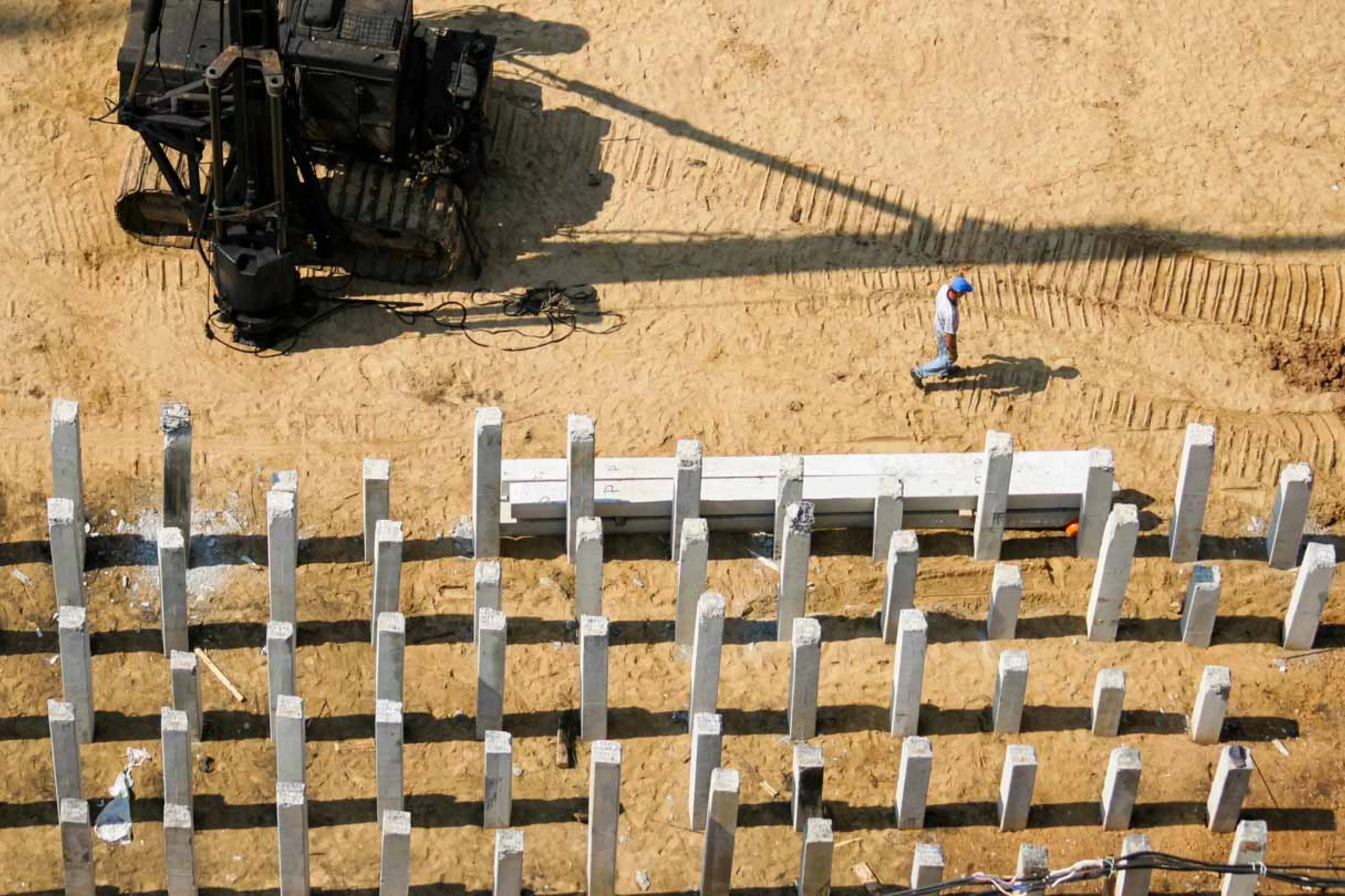 Aerial view of piles in rows